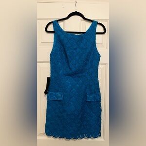 Bebe new with tags blue dress. Pit to pit 17in